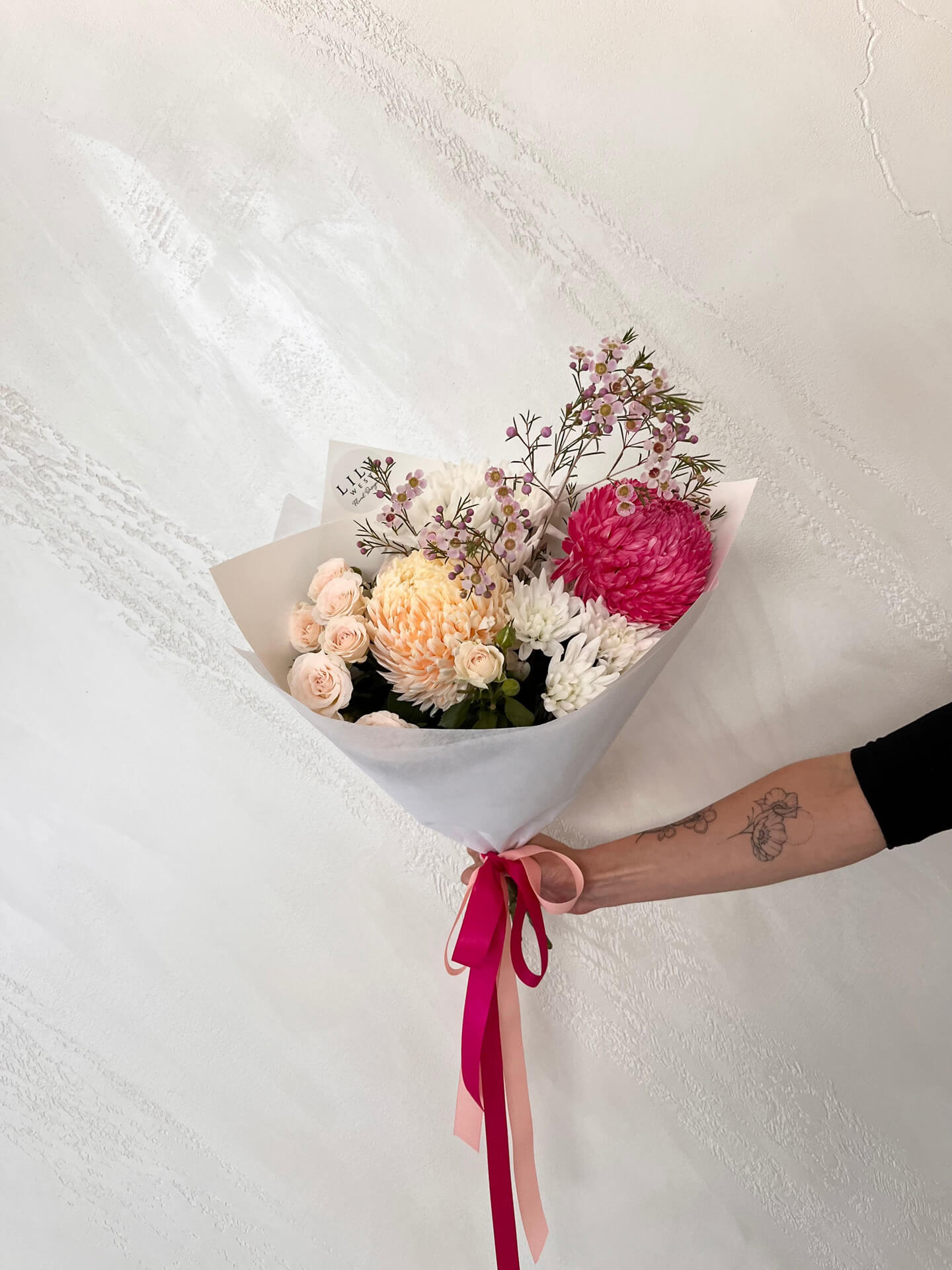 A sweet little bouquet of seasonal blooms.