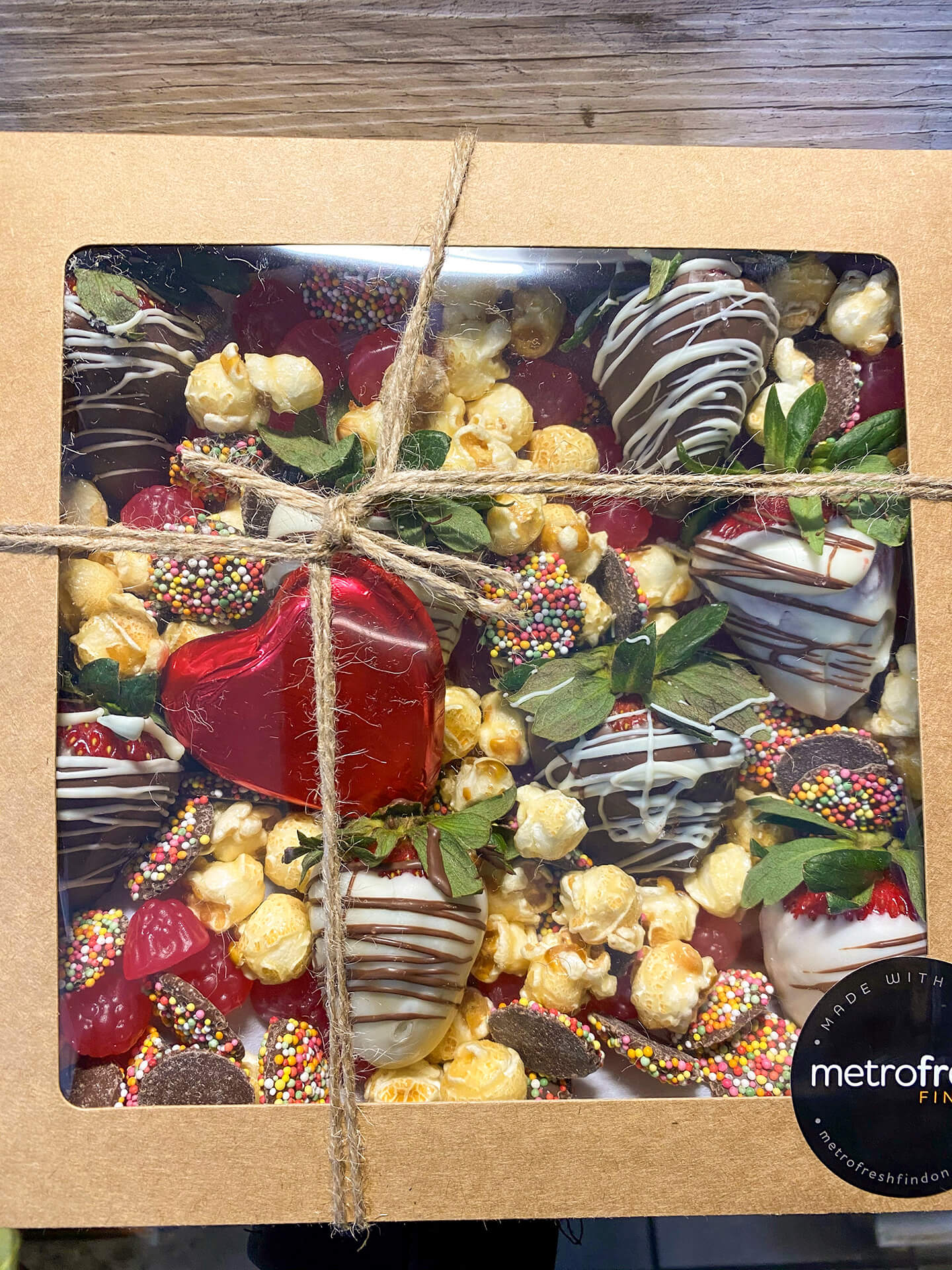 Strawberry delight box filled with delicious treats perfect to spoil a sweet tooth.